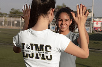 t-shirt-mockup-of-a-girl-celebrating-with-her-soccer-teammate-33556_edited.jpg