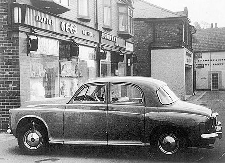 Grandads car outside the shop c1963 (c) Janet Woolf.jpg