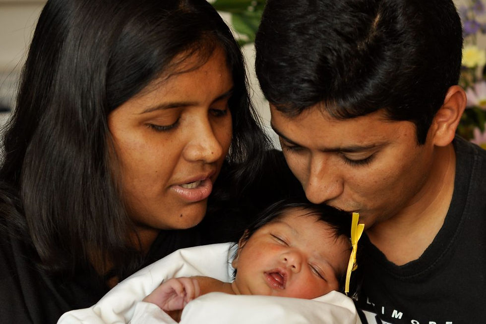 Bindu Sudhir Sabbavarapu and Her Husband the Day Their Daughter was Born