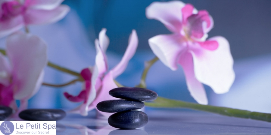 Rejuvenating facial treatment with botanical extracts, bright airy spa setting, clean white tones