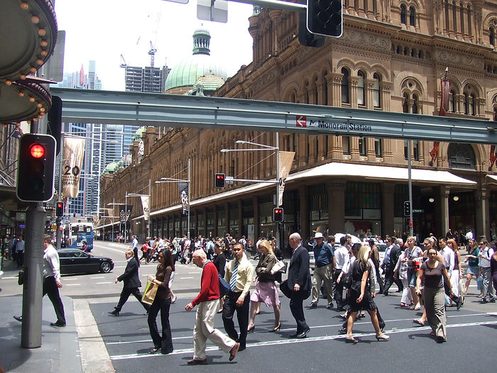 Walkers on a busy city street Walkers on a busy city street