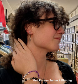 Ear & Nose Piercing Red Parlour Tattoo & Piercing