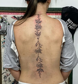 Flowers on Spine Tattoo  Red Parlour Tattoo & Piercing