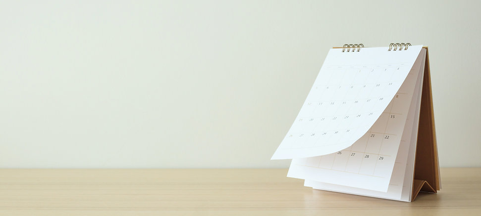 picture of a monthly calendar on a desk