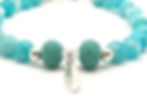 Pulsera mujer plata, amazonita y cristal. Borla verde y dije pluma de plata