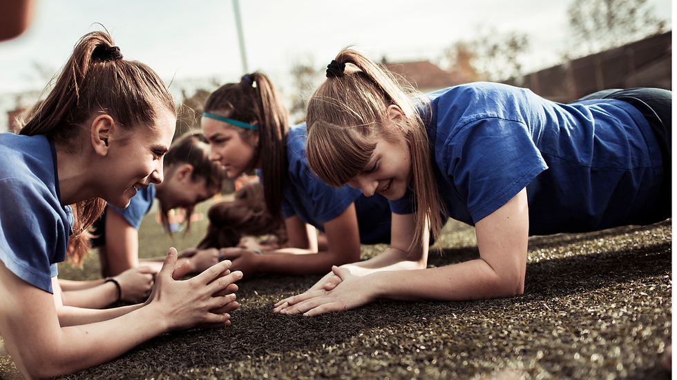 youth athletes doing plank
