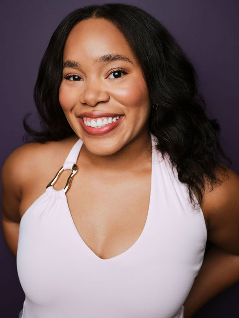Purple smiley headshot.jpg