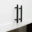 Black Knurled Pulls on White Cabinets