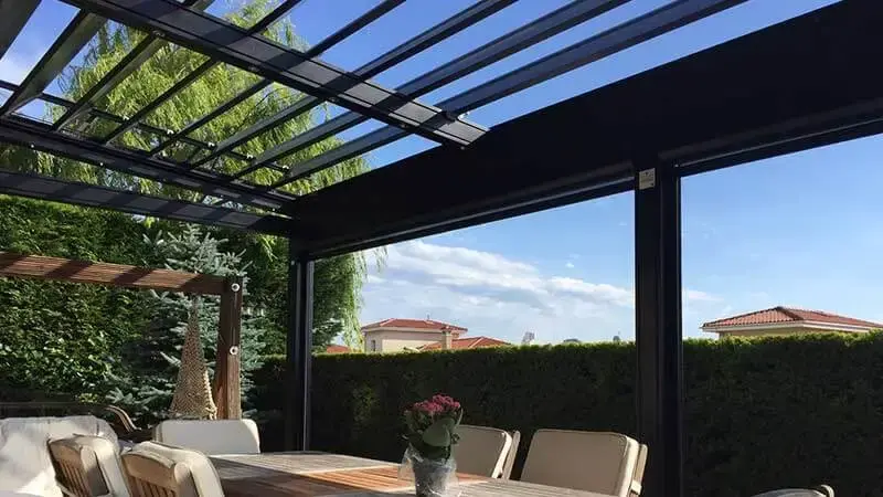 Biclimate rolling roof pergola in NYC