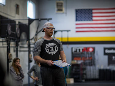 Gym owner checking their onboarding checklist