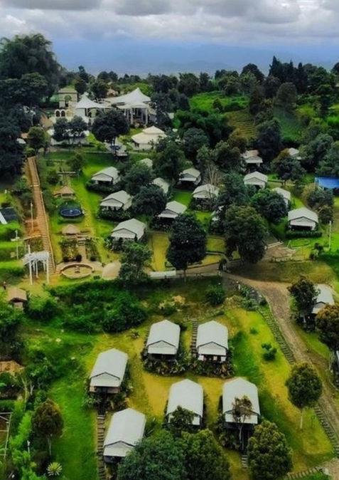 Aerial view of glamping tents and landscaped grounds at Trizara Resorts in Lembang.