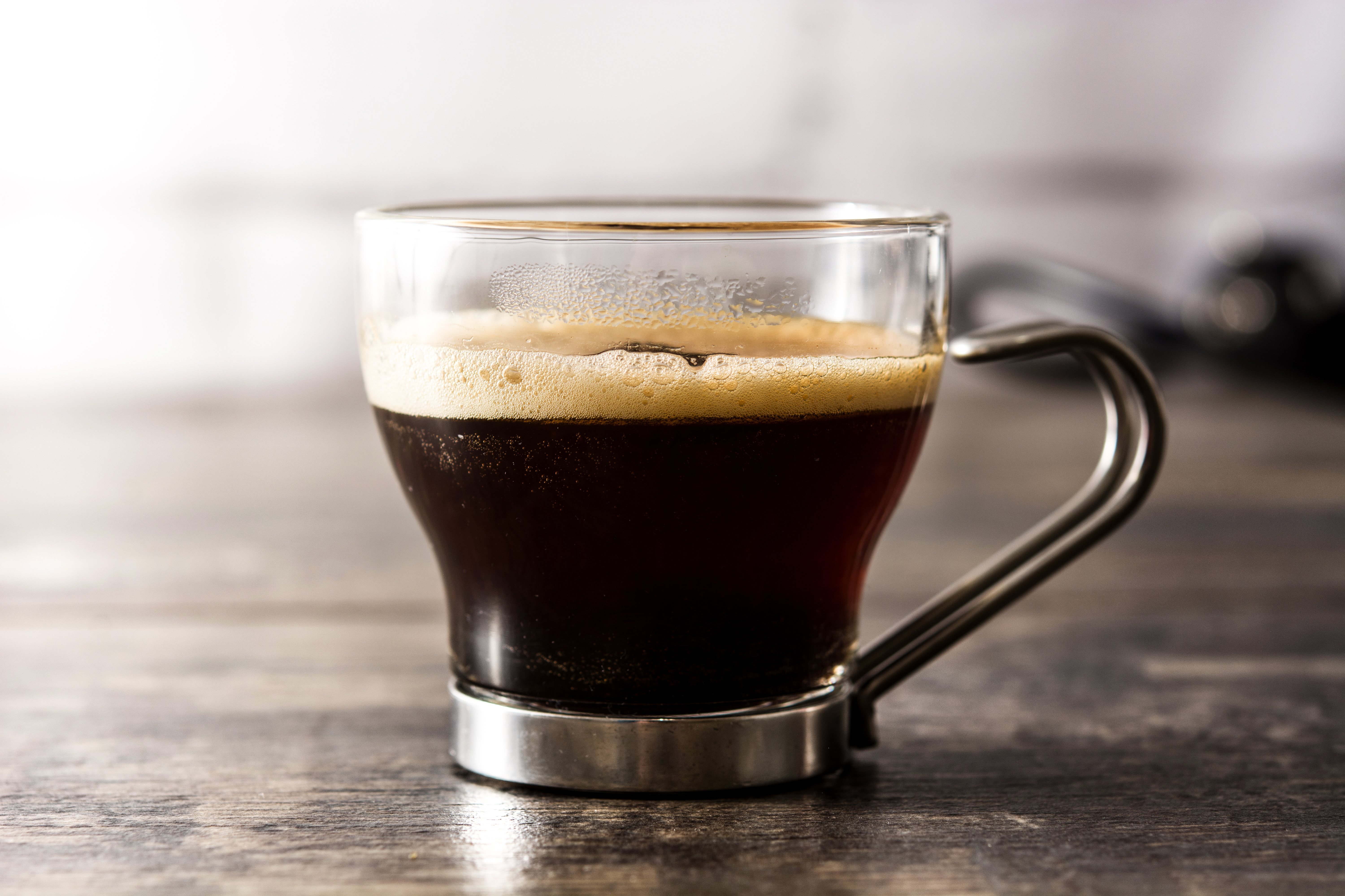 coffee-glass-coffee-grain-wooden-table.jpg