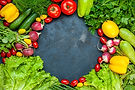 top-view-fresh-vegetables-tomatoes-lettuce-radish-lemon-zucchini-parsley-cherry-tomatoes-d