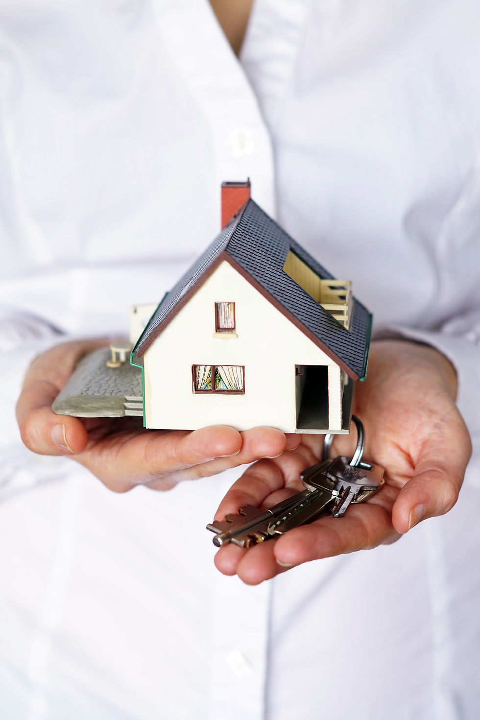 vertical-closeup-shot-person-thinking-buying-selling-house.jpg