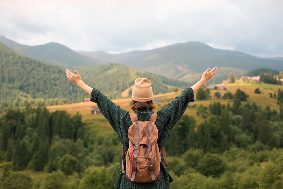 young-female-traveler-enjoying-rural-surroundings.jpg