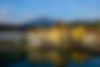 colorful-buildings-near-river-surrounded-by-mountains-lucerne-switzerland.jpg