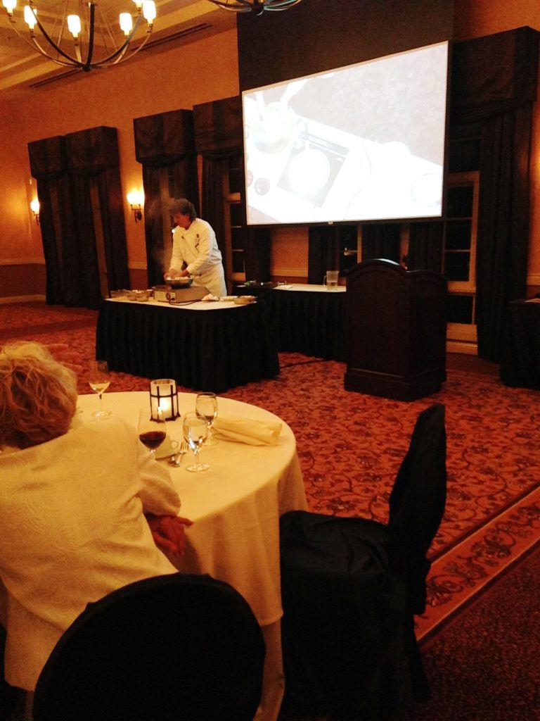 Chef Thomas gives a cooking demonstration