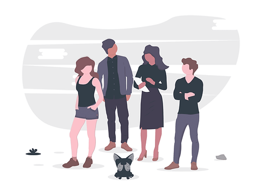 Four people discussing something with a dog in front of them.