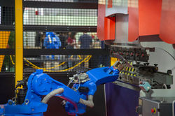 The robot arm for handing sheet metal in