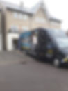 Black removals van parked near a residential property overlayed with a five star customer review box