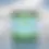 Thumbnail: A jar of Aroma Sculpt energize jar surrounded by water and clouds.