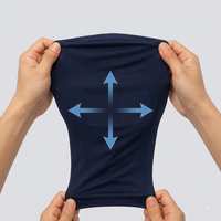 Hands stretching the Shield balaclava fabric in four directions
