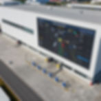 Building with large screen displaying traffic operations
