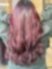 Long wavy pinkish-purple hair