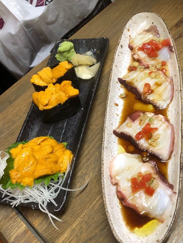 Octapus Carpaccio and Sea Urchin appetizers (Photo courtesy of Anna Ing.)