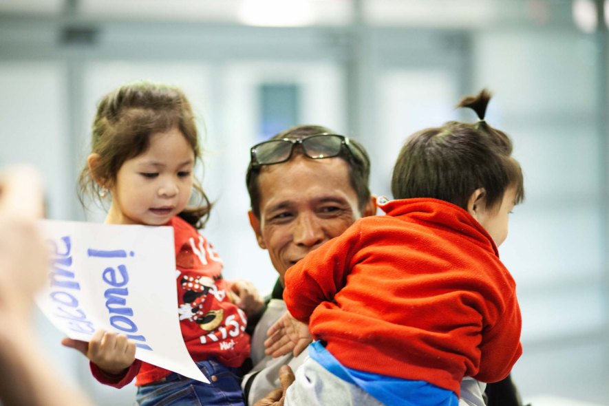 Chea was reunited with his family at Logan Airport in February. (Photo courtesy of Asian American Resource Workshop.)