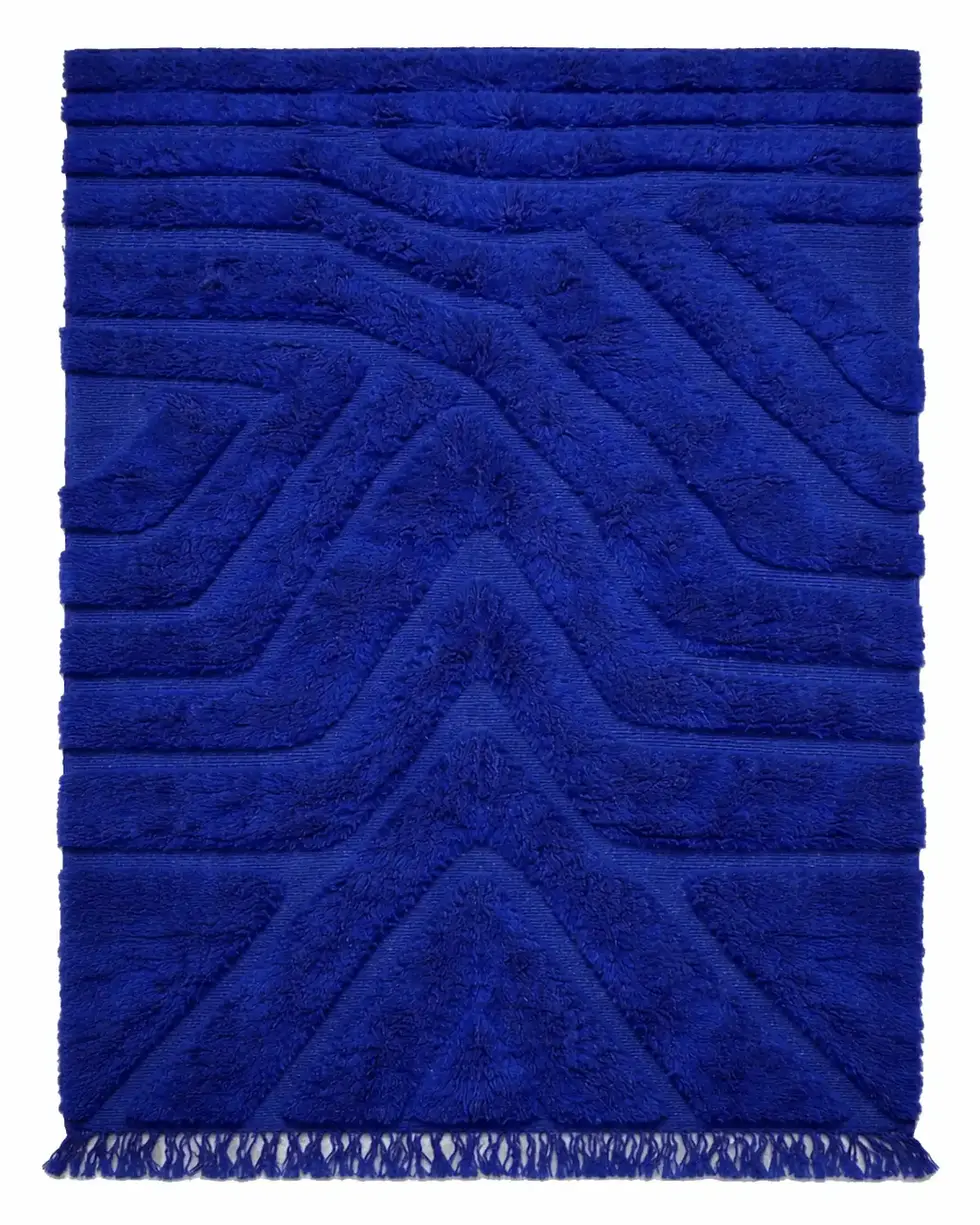 Blue Moroccan wool rug with geometric relief pattern