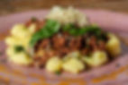 Gnocchi, Boloñesa de Ternera y Butifarra, Ras-el-Hanout, Salsa de Naranjas, Miel y Mostaza