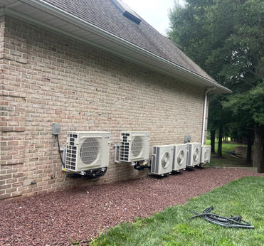 Air conditioning units on brick building