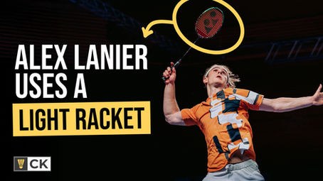 alex lanier jumping for a shot with his badminton racket