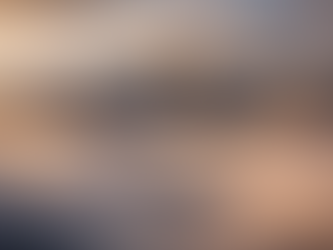 Mount Whitney rising above a layer of clouds in the Sierra Nevada