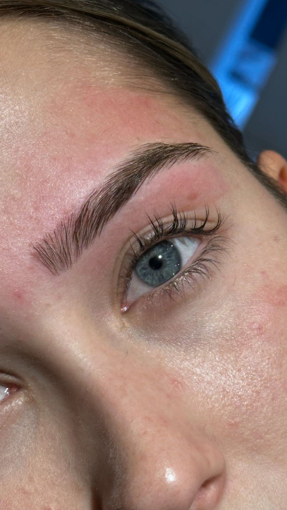 Natural beauty enhanced with a lash lift and tint, complemented by expertly shaped and tinted brows by Ira Bale Brows.