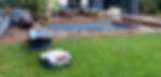 Honda Miimo dans un beau jardin avec piscine.jpg