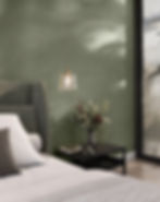 Green wallcovering in a bedroom.