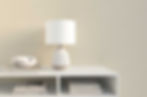 Side table with linen-inspired wallcovering on the wall