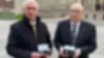 Bryn Hughes and Paul Bone had campaigned for recognition of their PC daughters Nicola and Fiona who died on duty
