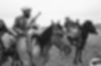 Three Muslim rebels, one armed with a Soviet-made AK-47 assault rifle, left, the others with older bolt-action rifles, pose on horseback during a rebel meeting at village near Herat, on February 15, 1980. Despite the presence of Soviet and Afghan government troops in the area, the rebels patrolled the mountain ranges along the Afghan-Iran border.