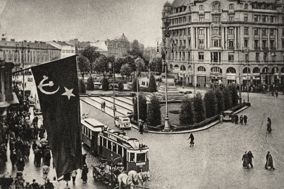 Market Square in Lvov, Poland. The hammer and sickle hangs over Rachman's home town during the short period before the Nazi invasion.