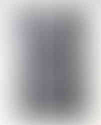 Woman from behind in black corset, white shorts, and stockings.