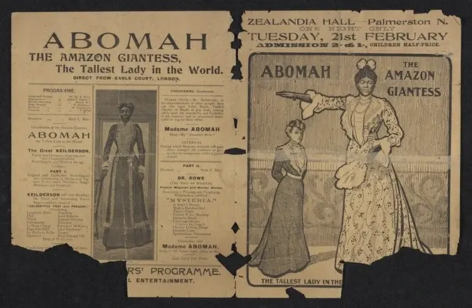 Vintage poster features "Abomah, the Amazon Giantess" in a long dress, promoting her show at Zealandia Hall. Text details event information.