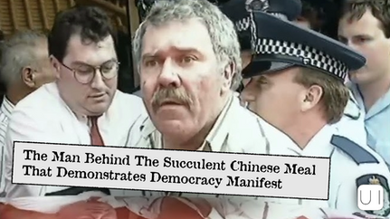 Policemen restrain a mustached man in a crowd. Text overlay reads: "The Man Behind The Succulent Chinese Meal That Demonstrates Democracy Manifest."