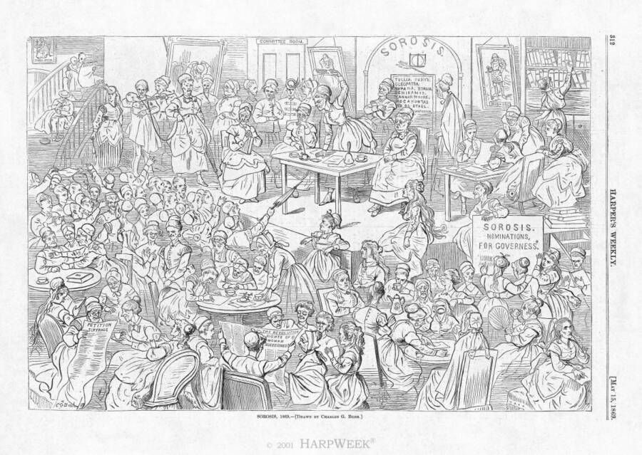 A large gathering of women in a hall, engaged in discussions and activities. Signs read "Sorosis" and "Petition for Suffrage." Monochrome sketch.