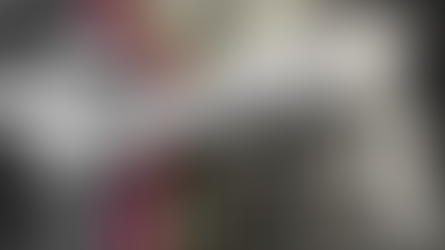 Artistic collage of women in surreal poses: one perches on a stool, another in a tub, a third reclines on a skull. Monochrome and stylized.