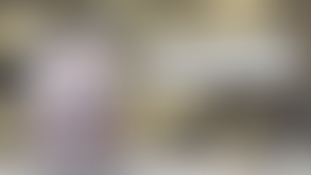 Gravestone reads: "Unknown Man Died Eating Library Paste July 14 1908." Sepia-toned town scene in background, creating a nostalgic mood.