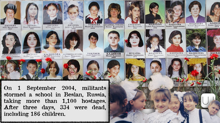 Photos of children and adults are displayed with red flowers below, commemorating the 2004 Beslan school siege victims. somber mood.