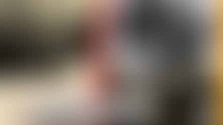 Protesters and soldiers clash during Bloody Sunday. People assist a fallen individual. The Irish Times headline visible. Somber mood.